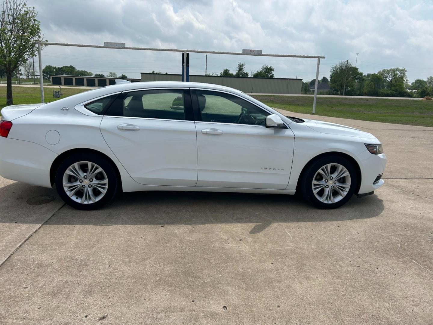 2015 White /Gray Chevrolet Impala CNG Sedan (2G1135SN0F9) with an 3.6L V6 engine, AUTOMATIC transmission, located at 17760 Hwy 62, Morris, OK, 74445, (918) 733-4887, 35.609104, -95.877060 - 2015 CHEVY IMPALA HAS THE 3.6 V6 ENGINE AND IS FWD. THE IMPALA IS A BI-FUEL CAR THAT RUNS ON BOTH CNG (COMPRESSED NATUAL GAS) OR GASOLINE. THIS CAR FEATURES KEYLESS REMOTE START, KEYLESS REMOTE ENTRY, POWER LOCKS, POWER WINDOWS, POWER SEATS, POWER MIRRORS, AM/FM STEREO, CD PLAYER, BLUETOOTH, LEATHER - Photo#3